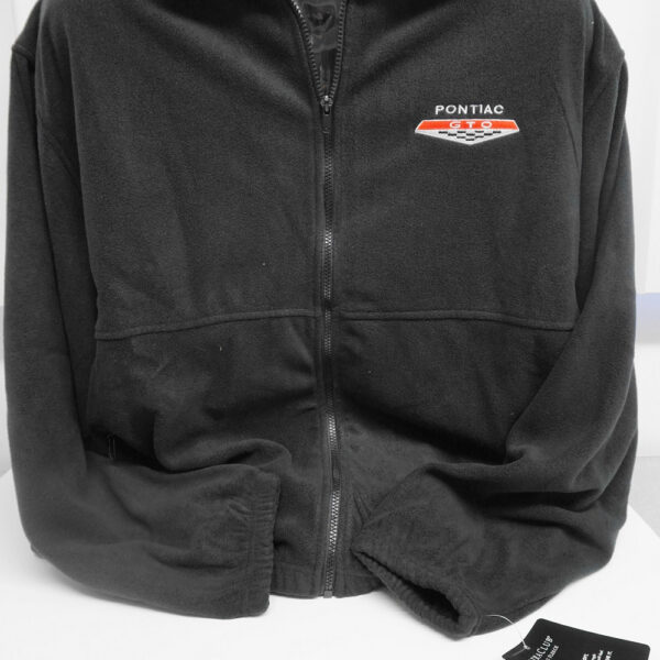 Black zip-up jacket on mannequin
