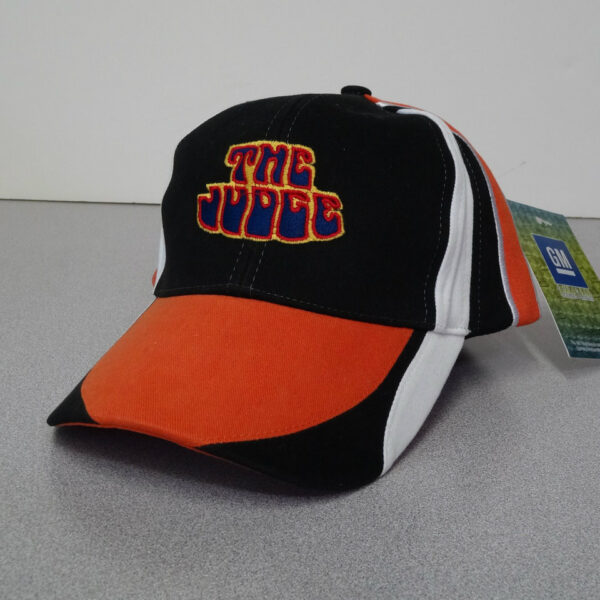 Black and orange cap with "The Judge