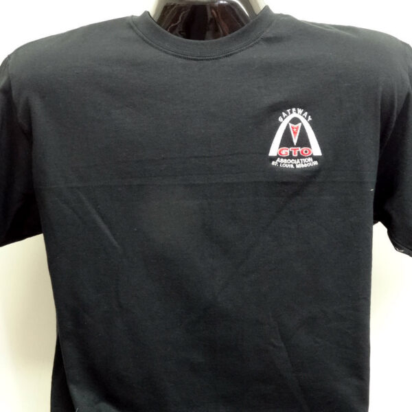 Black T-shirt featuring emblem design