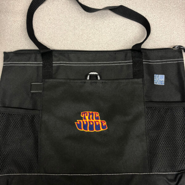 Embroidered logo tote bag on table